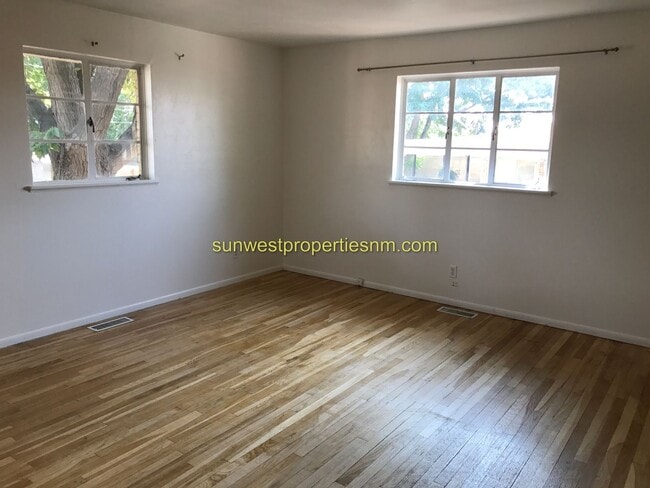 Building Photo - 3 Bedroom, 2 Bath, Fireplace and Fenced Ba...