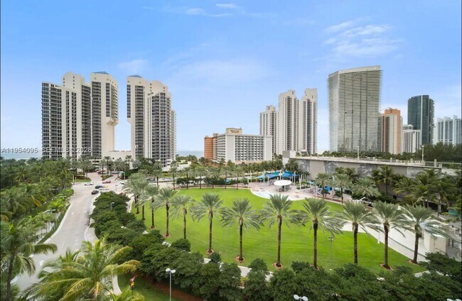 Building Photo - 19370 Collins Ave