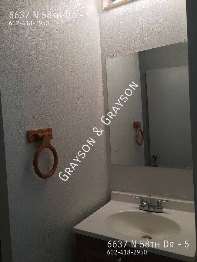 Building Photo - 6637 N 58th Dr