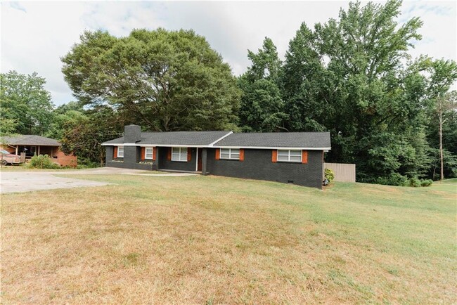 Building Photo - 6914 N Baggett Rd