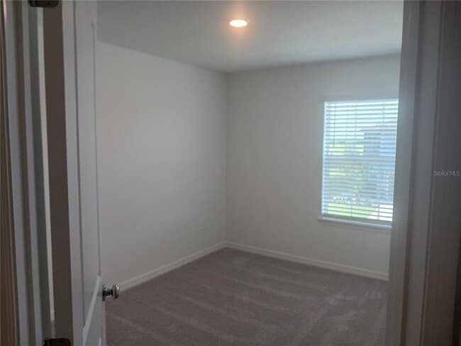 Building Photo - 8607 Tropical Aire Ln