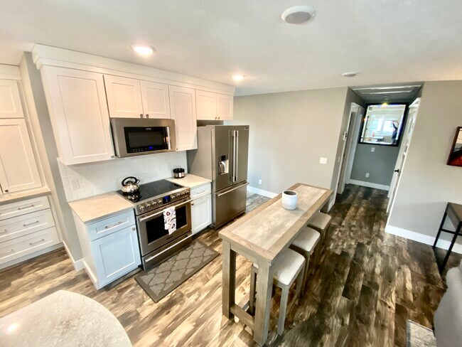 Kitchen 4 and Hallway to Bedrooms - 116 N Oak St