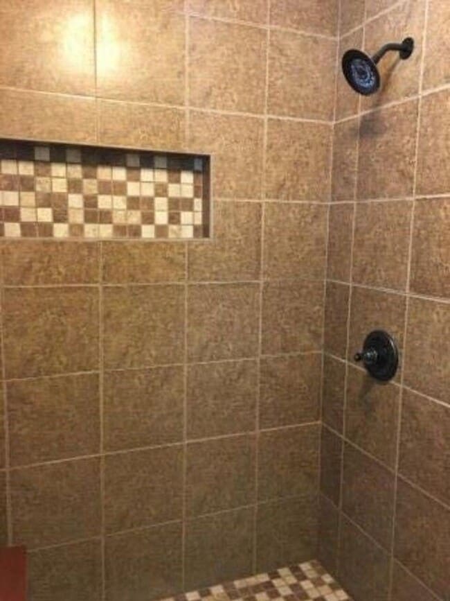 Building Photo - Spacious 3BR Brick Home with Open Split Floor Plan & Tiled Back Porch on Nearly an Acre