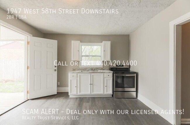 Building Photo - Stylish Downtown Living: Updated Downstair...