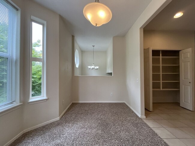 Building Photo - Spacious Three-Story Townhome Near Orenco Station with Attached Garage, Private Balcony, and Vaul...