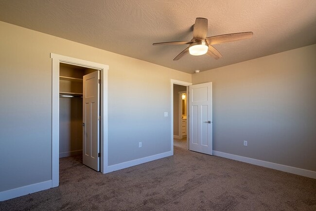 Building Photo - Amazing views! Like New 3 bedroom, 2.5 bath townhome, 2 car garage