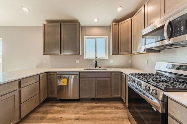 Building Photo - Move-In Special! FREE 50" TV for Qualified...