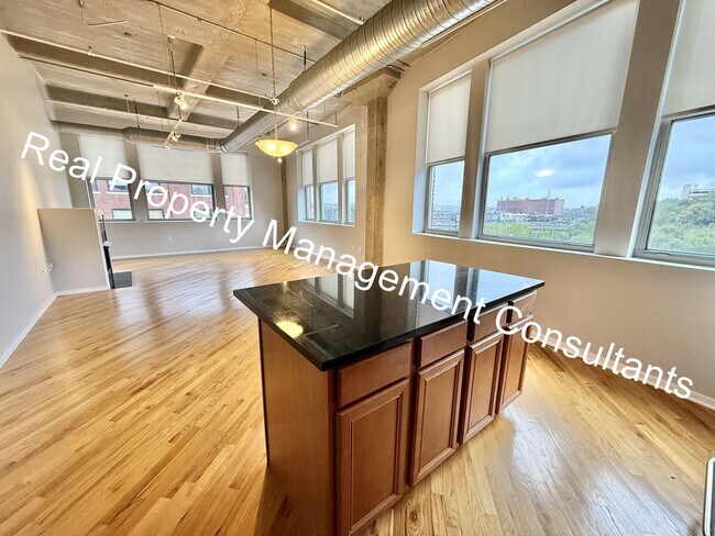 Building Photo - Luxury Living at Western Auto Building – 2 Bed, 2 Bath