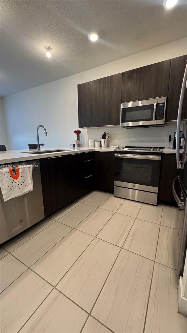 Building Photo - 6416 NW 102nd Ct