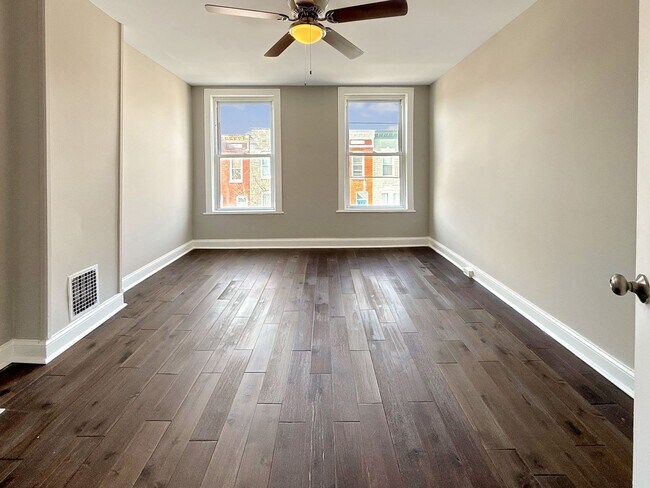 Building Photo - Charming Baltimore Rowhome with Private Backyard & Modern Updates