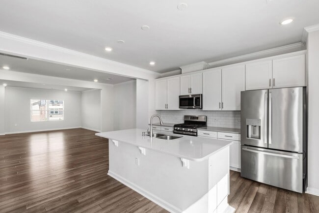 Building Photo - Bright, Spacious & Move-In Ready Townhome ...