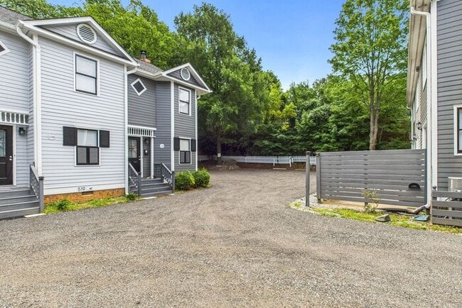 Building Photo - UNCG Area – Chancellors Court Townhomes. Walk to Campus and just minutes to Downtown!