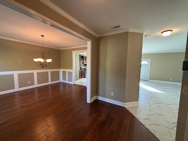 Building Photo - This property blends ample living space and storage with functional amenities.