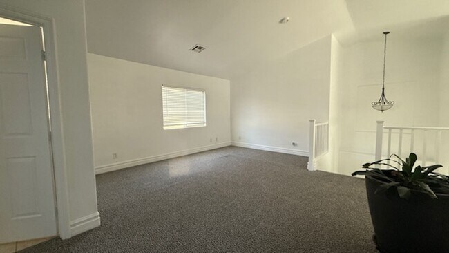 Building Photo - STUNNING 2 STORY HOME IN A GUARD GATED COM...