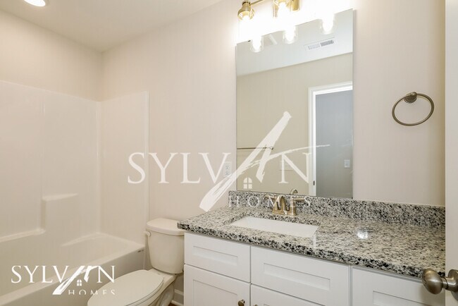 Building Photo - Lease today! No extra charge for contentme...