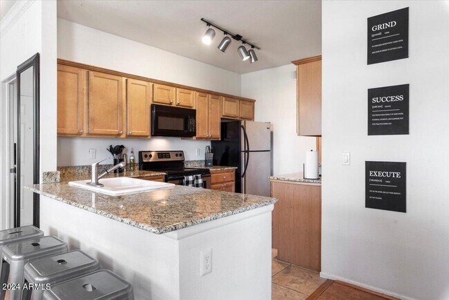 Building Photo - 7009 E Acoma Dr
