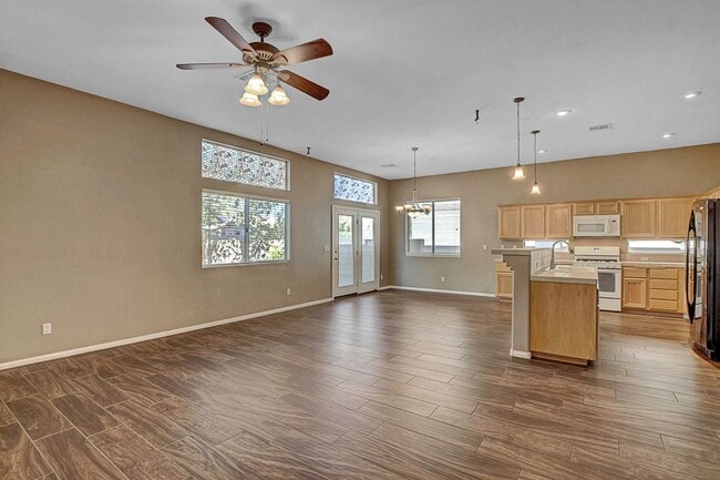 Building Photo - Gorgeous NW Single Story! 3 Car Garage! Serene Backyard.