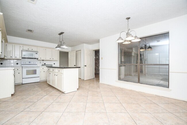 Building Photo - 6702 Spring Leaf Dr