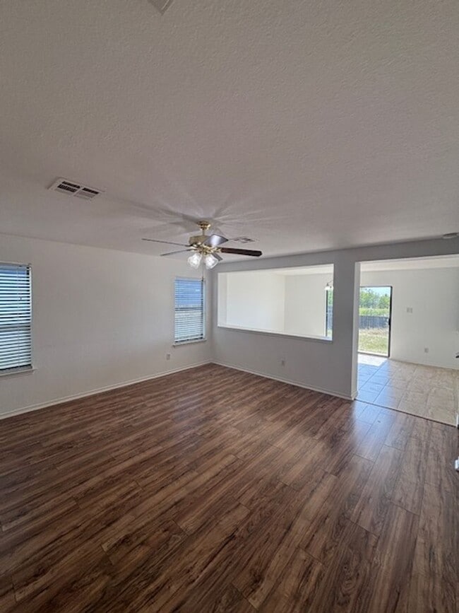 Building Photo - Move-In Ready 4-Bedroom Home with New Floo...