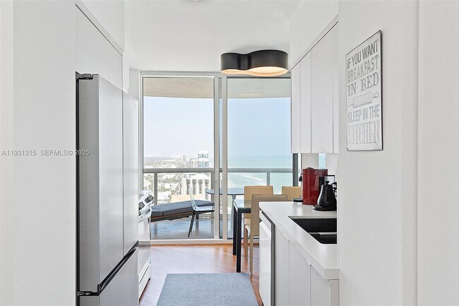 Building Photo - 6365 Collins Ave