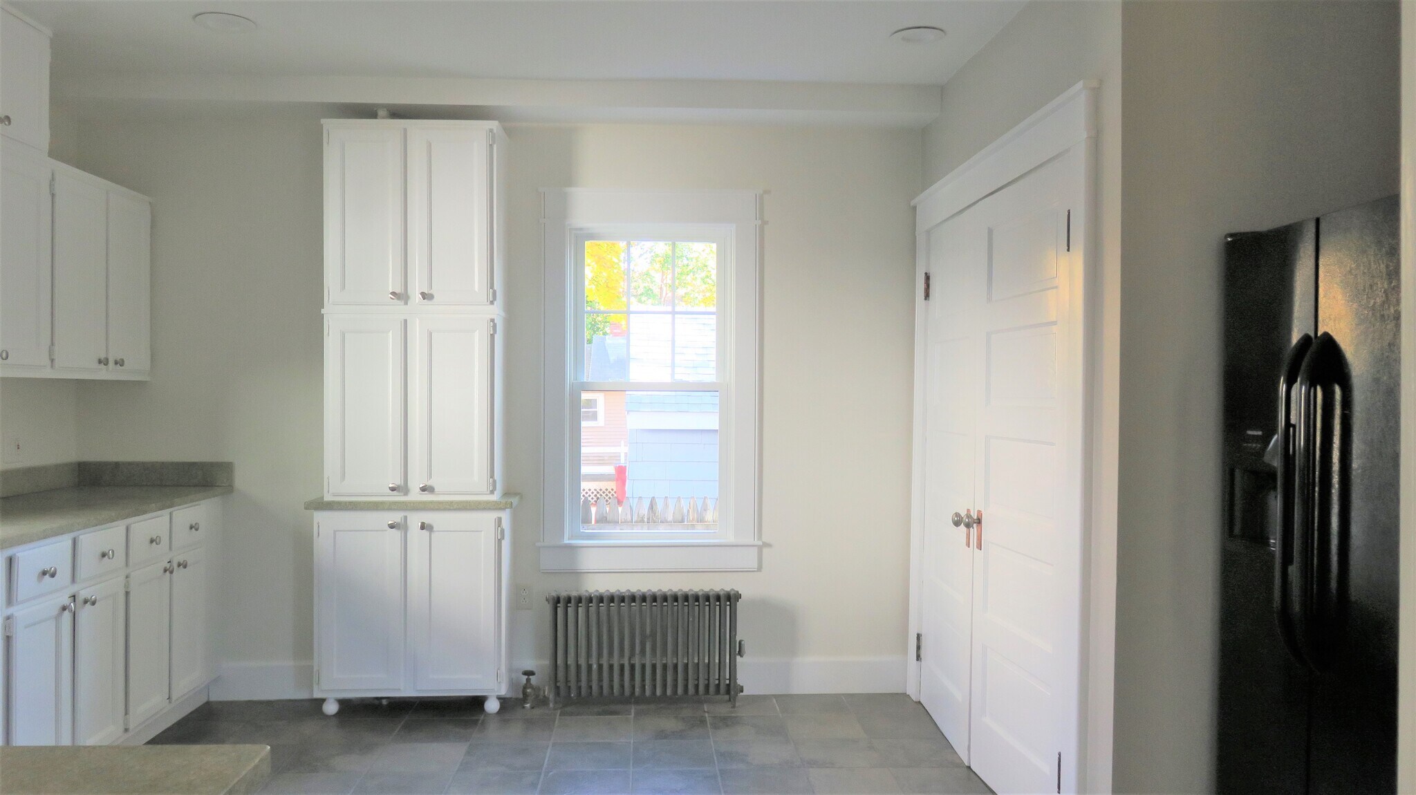 The laundry closet/pantry is behind the 2 doors on the right - 21 Courtland St