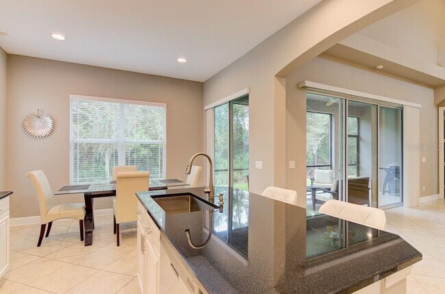 Building Photo - 4/3 Stylish and Spacious 2-story home with...