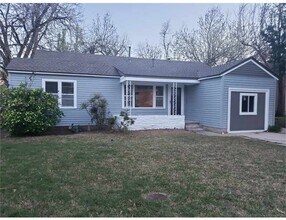 Building Photo - Cute 4 bedroom House