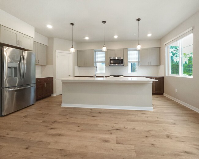 Building Photo - Newly Built 4-Bedroom Townhome with Modern...