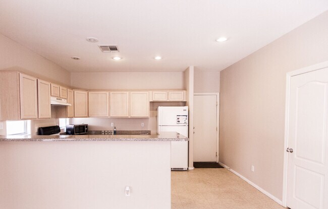 Building Photo - 8549 Peaceful Dreams St