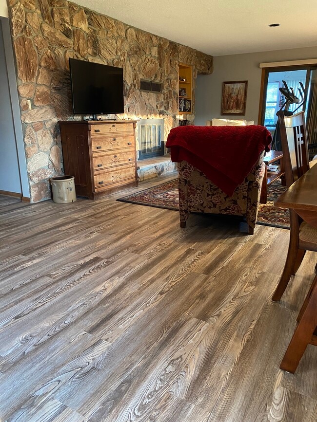 New flooring and paint through out most of the home. - 210 Elm Ave S