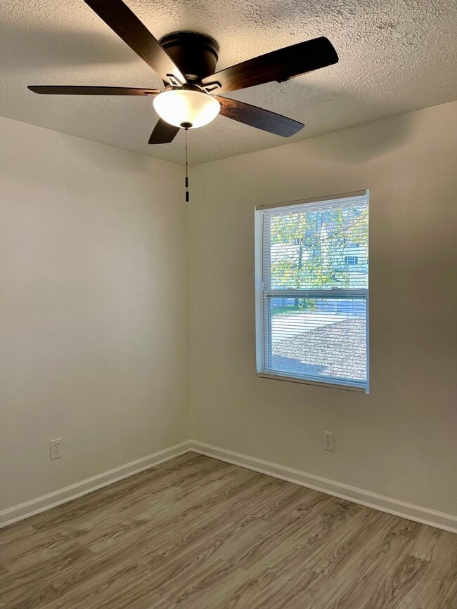 Building Photo - Updated 4 Bedroom Home with NO Carpet!