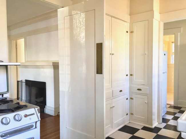 view from kitchen to living room and fire place - 3512 Pershing Ave