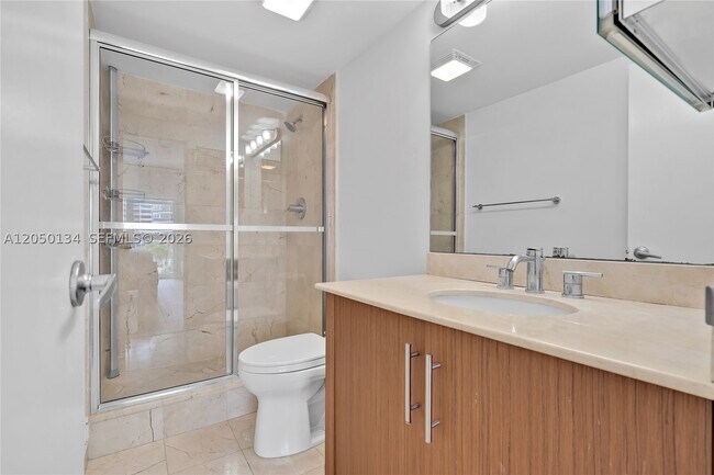 Building Photo - 10275 Collins Ave