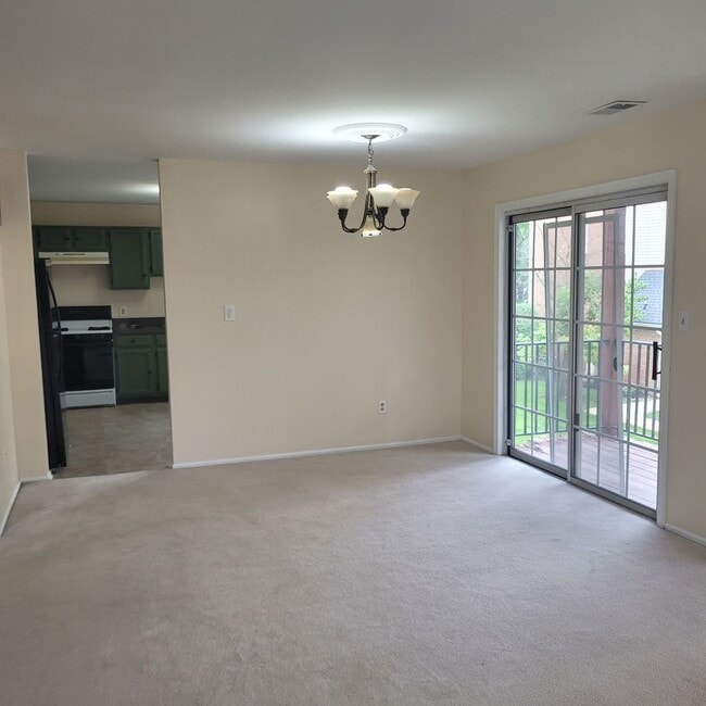 Building Photo - Spacious, freshly painted with lots of ame...