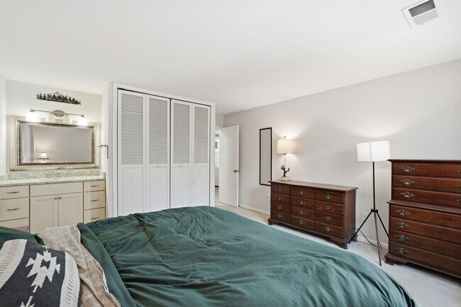 Building Photo - This beautifully refreshed condominium offers a refined blend of style and comfort