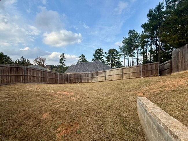 Building Photo - Tour Today: Charming 1-Story 4 Bedroom Home with Modern Comforts!