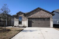 Building Photo - Welcome to this charming 3-bedroom, 2-bath...