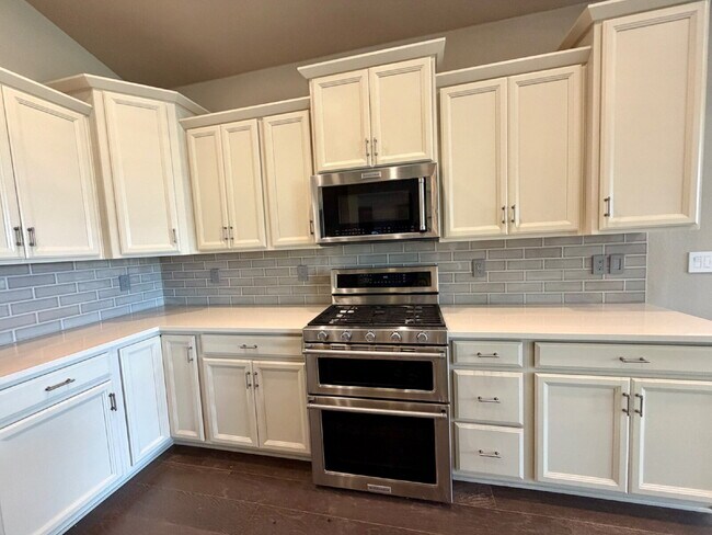 Building Photo - Luxury 4-Bedroom Ranch Featuring a Chef's Kitchen, Spa-Inspired Primary Suite & Finished Basement!!