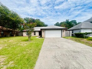 Building Photo - 8456 Bandera Cir W