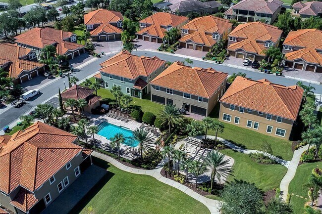 Building Photo - Stylish and Spacious 3/2.5 Townhome with Premium Features and Community Pools