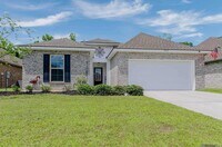 Building Photo - Modern 3 Bedroom Home with Private Backyard Views in Forestwood