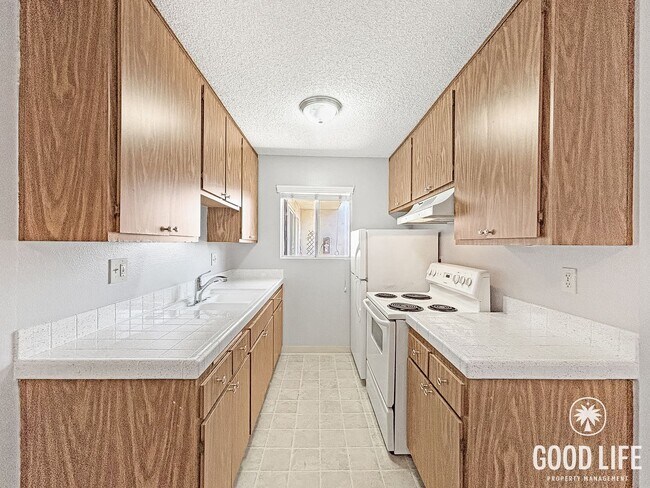 Building Photo - Comfortable 1BD/1BA Upper-Level Condo in North Park with Reserved Parking & On-Site Laundry