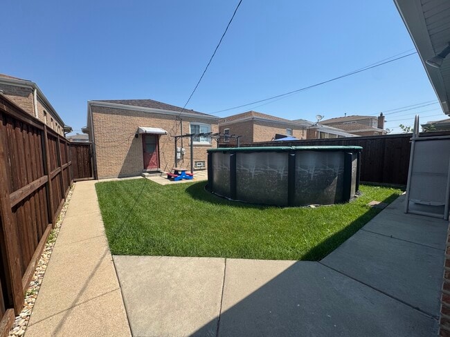 Building Photo - 6525 W 63rd Pl