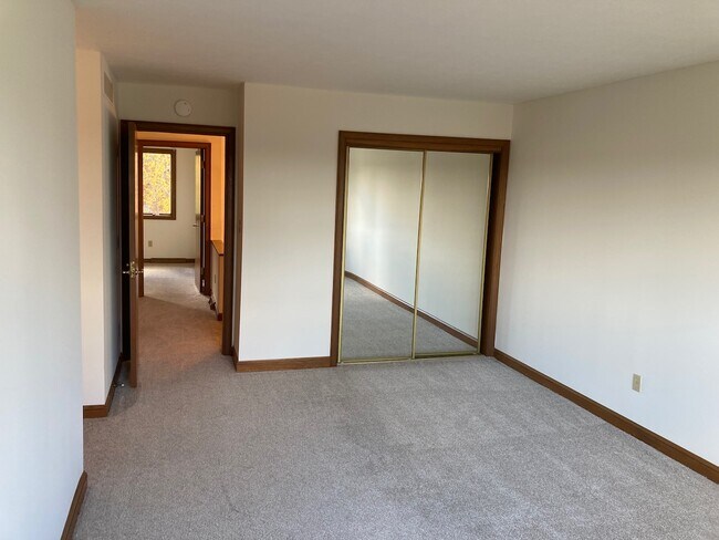 Primary Bedroom w/view to hallway & 2nd Bedroom - Juno Place Townhomes