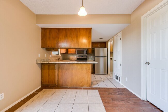 Building Photo - COMING JANUARY 2026 - Spacious 2-Bedroom Townhome with River View!