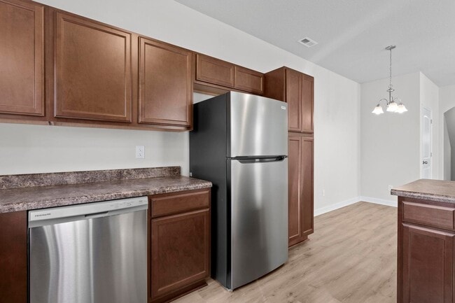 Building Photo - Townhome for Rent with Covered Patio!