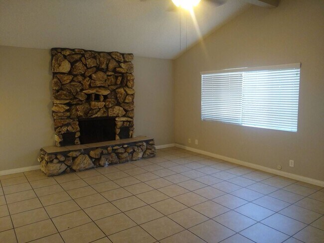 Building Photo - Coming Soon: Spacious 3 Bedroom Home with Fireplace, Covered Patio and Community Pool in SW Baker...