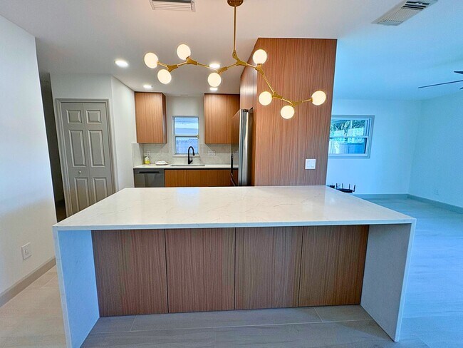 Building Photo - Fully Renovated 2BR Home with Designer Finishes & Fenced Yard