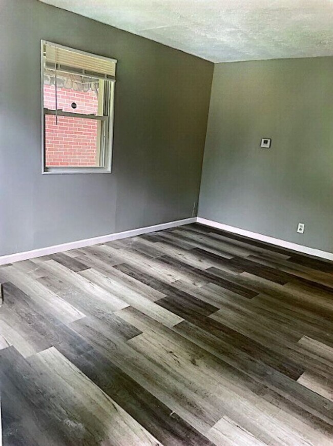 Building Photo - Available now! Great 2 bedroom with AC and detached garage!