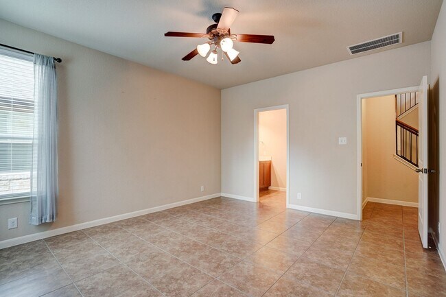 Building Photo - Bright & Roomy 4BR • 2.5BA • Two-Level Living